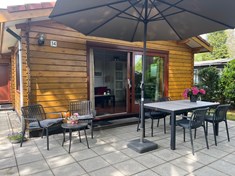 Vakantie in Lage Vuursche, binnen kijken in één van de Scandinavische Bungalow op Bungalowpark ”De Spar”.